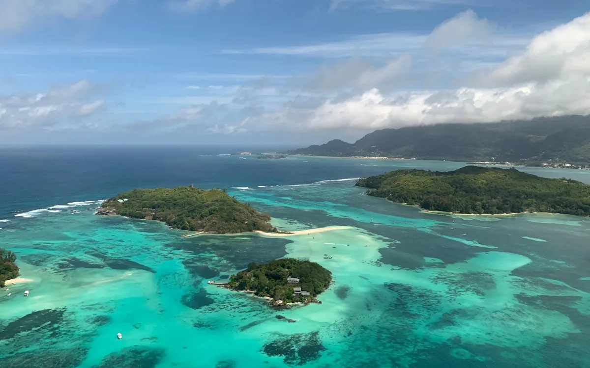 Reef and islands in the Sainte Anne Marine National Park from the air