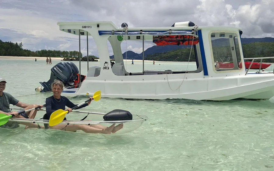 A glass-bottom boat in the Sainte Anne Marine National Park